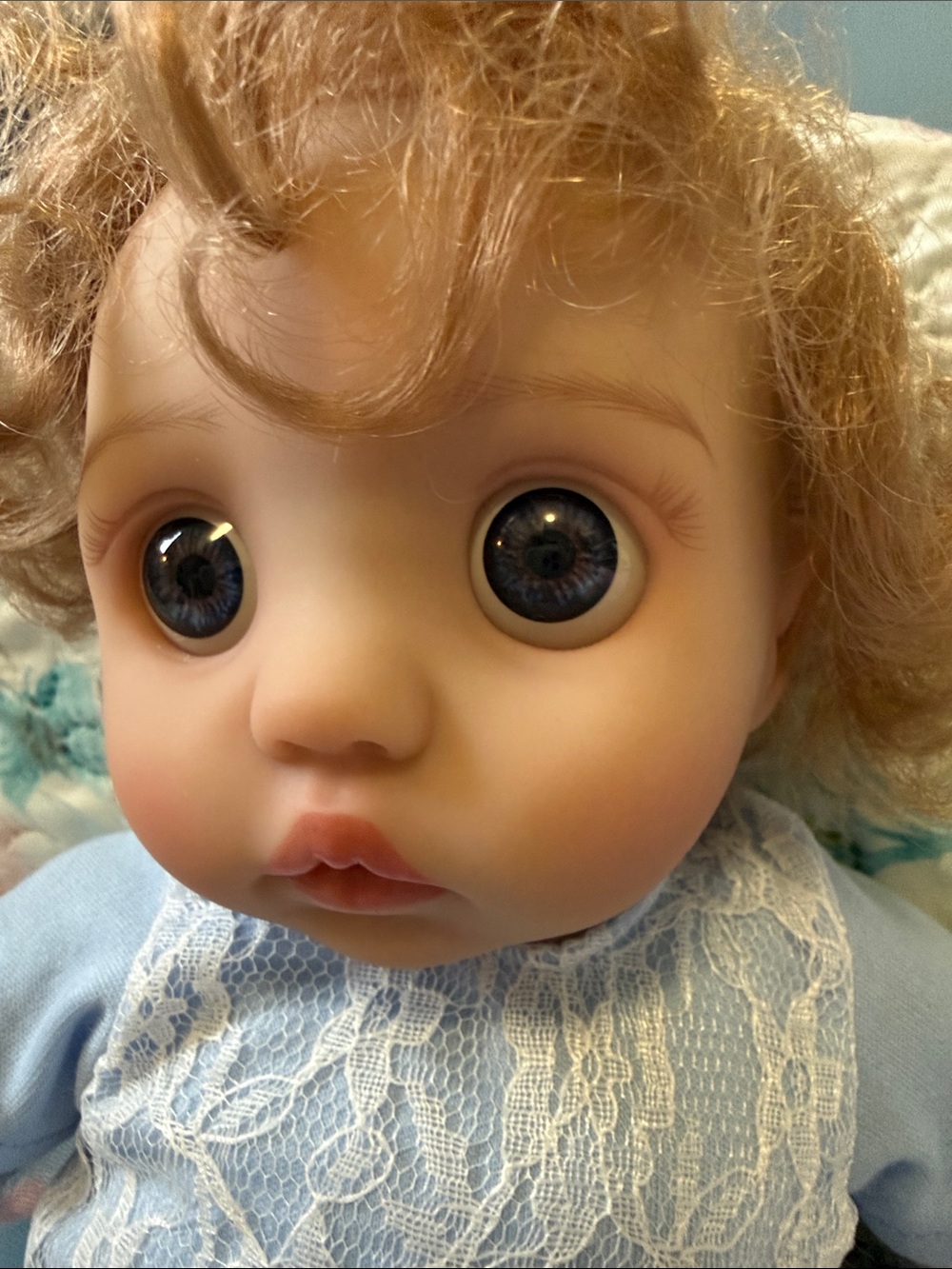 NWT..Reborn Blue-Eyed Baby Doll with Curly Hair. Adorable..